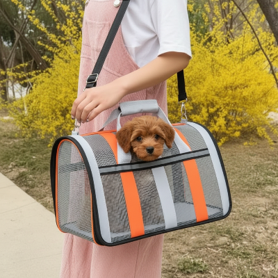 sac de transport pour chien orange avec chiot marron