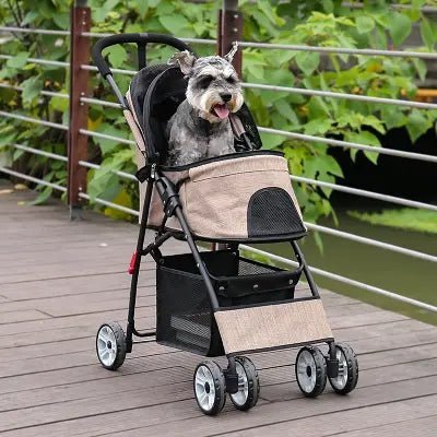 schnauzer confortable dans sa poussette chien